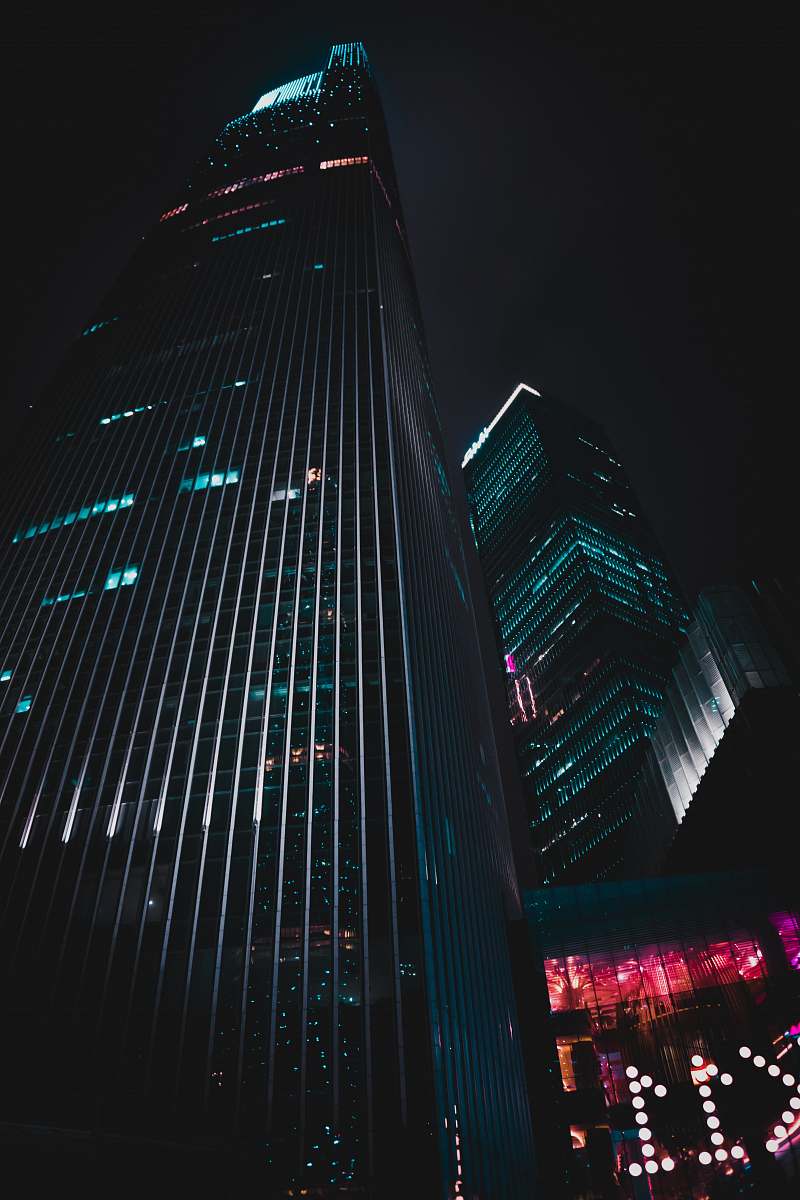office building low-angle photography of black high-rise building light